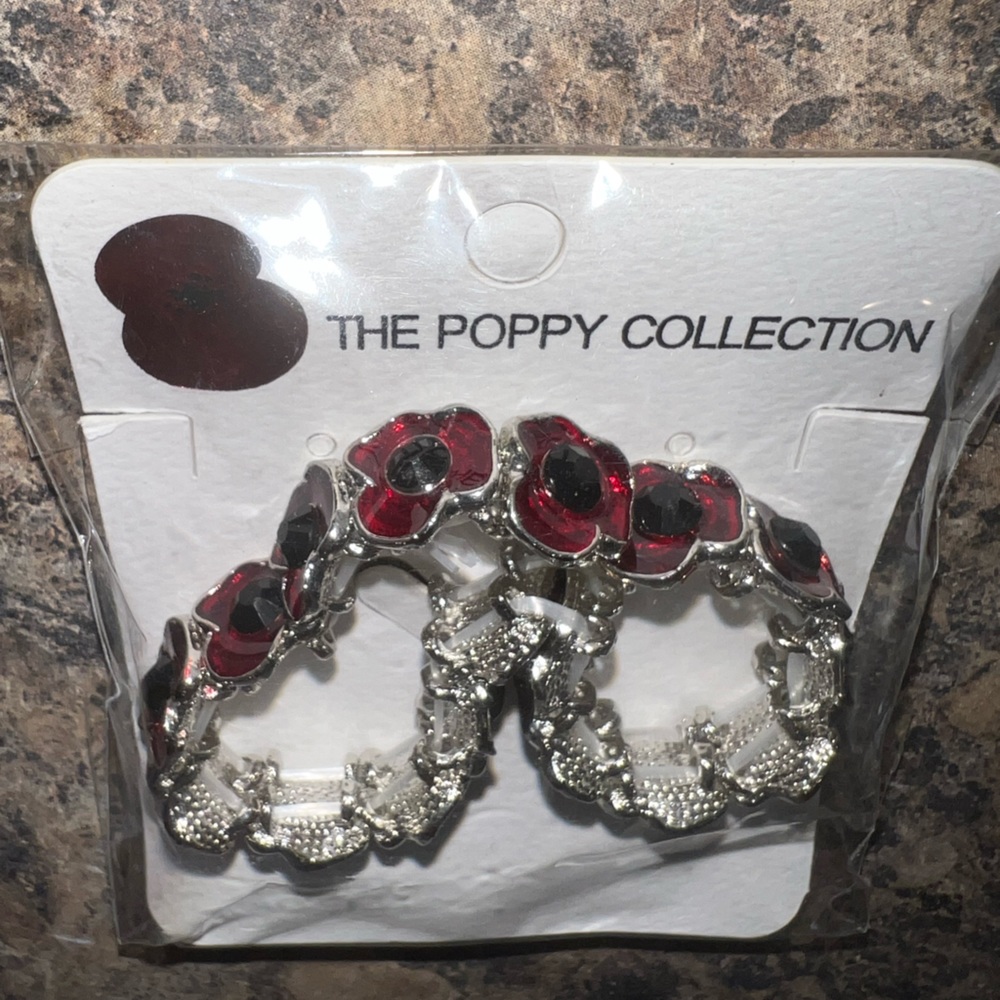 $6 POPPY BRACELET. NEW. STAINLESS STEEL. $6 if bundled - Picture 3 of 5